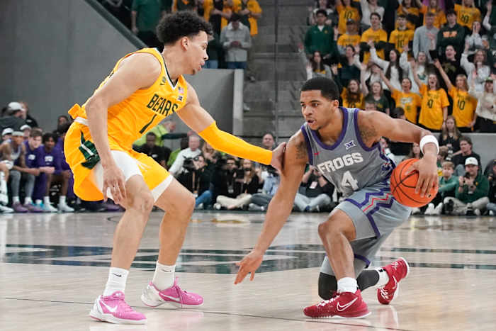 Jan 27, 2024; Waco, Texas, USA; TCU Horned Frogs guard Jameer Nelson Jr. (4) works on Baylor Bears guard Miro Little (1) during the first half at Paul and Alejandra Foster Pavilion. Mandatory Credit: Raymond Carlin III-USA TODAY Sports